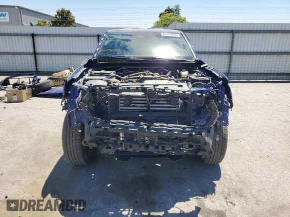 2024 Toyota Tacoma SR5 with VIN 3TMKB5FN4RM003206, listed as a Copart auction lot 64324035 with 8,012 mi miles and Salvage title. Bid and sale history available at DreamBid. Image 5.