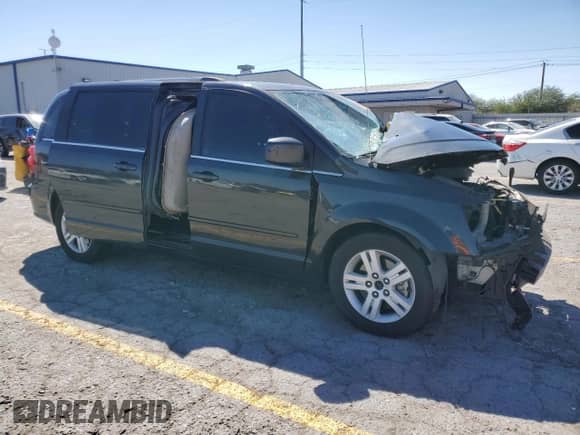 2012 Dodge Grand Caravan Crew z VIN 2C4RDGDG8CR370358, wystawiony jako Copart lot #80337285 z przebiegiem Nie podano mil oraz Nie do naprawy • Non repairable. Historia ofert i sprzedaży dostępna na DreamBid. Obrazek 4.
