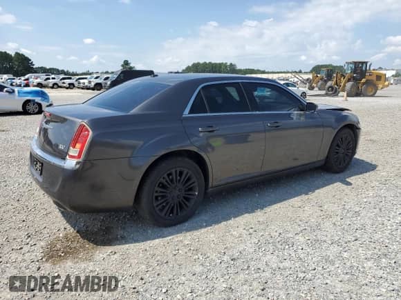 2014 Chrysler 300 с VIN 2C3CCARGXEH260357, выставлен на аукционе Copart как лот 69888735 с пробегом 186 811 миль миль и Списание • Salvage title. История ставок и продаж доступна на DreamBid. Изображение 3.