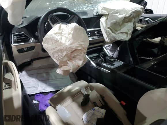 2022 BMW 4 Series M440i xDrive с VIN WBA13AR08NCJ41843, выставлен на аукционе Copart как лот 49146455 с пробегом Не указан миль и На запчасти • Non repairable. История ставок и продаж доступна на DreamBid. Изображение 8.