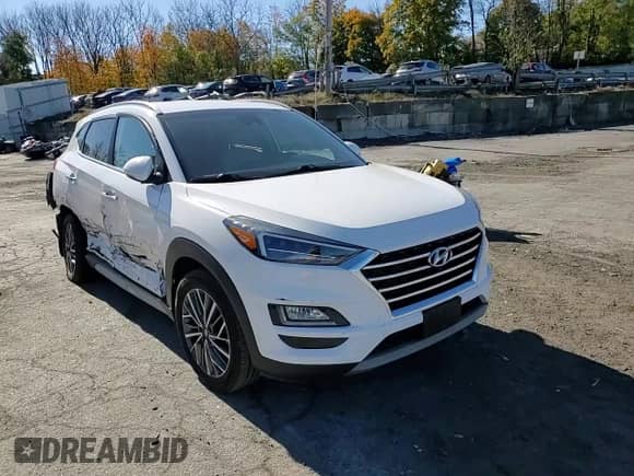 2020 Hyundai Tucson Limited with VIN KM8J3CAL7LU152386, listed as a Copart auction lot 87274165 with 59,469 mi miles and Salvage title. Bid and sale history available at DreamBid. Image 14.