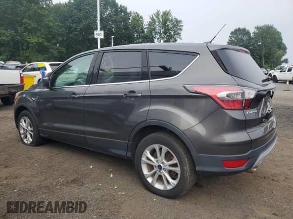 2017 Ford Escape SE z VIN 1FMCU9GD1HUA69276, wystawiony jako Copart lot #66504355 z przebiegiem 131 784 mil mil oraz Czysty tytuł • Clean title. Historia ofert i sprzedaży dostępna na DreamBid. Obrazek 2.