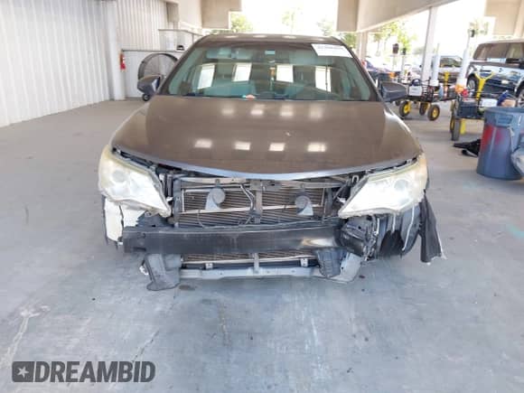 2013 Toyota Camry LE z VIN 4T1BD1FK7DU064283, wystawiony jako IAAI lot #42308435 z przebiegiem 183 355 mil mil oraz . Historia ofert i sprzedaży dostępna na DreamBid. Obrazek 12.