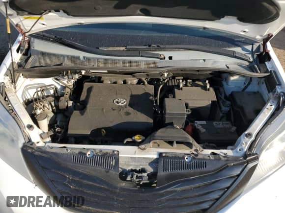 2012 Toyota Sienna LE with VIN 5TDJK3DC4CS040779, listed as a Copart auction lot 70596435 with 349,305 mi miles and Clean title. Bid and sale history available at DreamBid. Image 12.