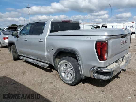 2019 GMC Sierra 1500 SLE z VIN 3GTU9BED7KG255905, wystawiony jako Copart lot #70749295 z przebiegiem Nie podano mil oraz Szkoda całkowita • Salvage title. Historia ofert i sprzedaży dostępna na DreamBid. Obrazek 2.