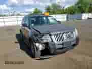 2008 Mercury Mariner Premier with VIN 4M2CU971X8KJ35114, listed as a Copart auction lot 70386905 with 148,184 mi miles and Salvage title. Bid and sale history available at DreamBid. Image 14.