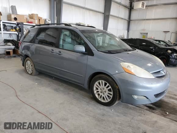 2010 Toyota Sienna XLE с VIN 5TDYK4CC3AS322737, выставлен на аукционе Copart как лот 71288485 с пробегом 307 807 миль миль и Списание • Salvage title. История ставок и продаж доступна на DreamBid. Изображение 4.