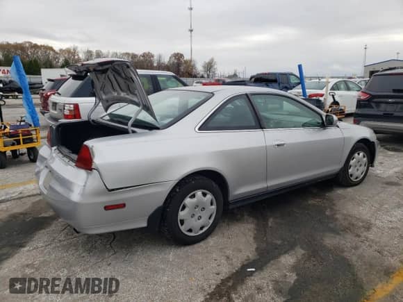2001 Honda Accord LX z VIN 1HGCG32471A021368, wystawiony jako Copart lot #80389674 z przebiegiem 141 817 mil mil oraz Szkoda całkowita • Salvage title. Historia ofert i sprzedaży dostępna na DreamBid. Obrazek 3.