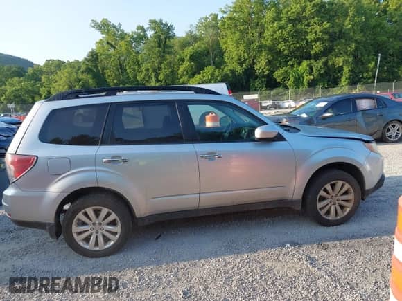 2011 Subaru Forester X Premium with VIN JF2SHADCXBH741354, listed as a IAAI auction lot 42568062 with 205,768 mi miles and . Bid and sale history available at DreamBid. Image 13.