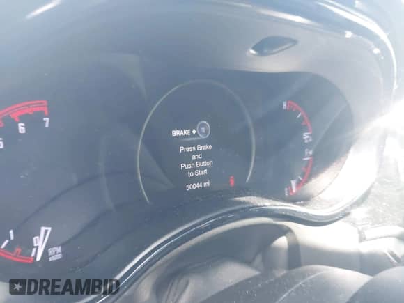 2023 Dodge Durango Hemi Orange with VIN 1C4SDHCT0PC635715, listed as a IAAI auction lot 42943681 with 50,044 mi miles and . Bid and sale history available at DreamBid. Image 7.