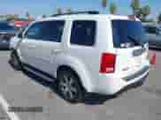 2013 Honda Pilot Touring with VIN 5FNYF4H90DB080130, listed as a IAAI auction lot 43412337 with 173,221 mi miles and . Bid and sale history available at DreamBid. Image 3.