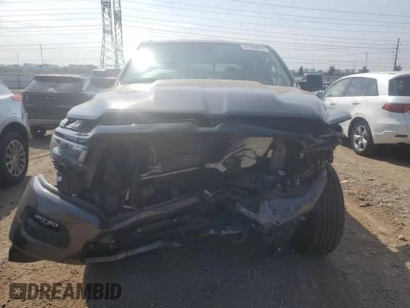 2025 Ram 1500 Tradesman with VIN 1C6RRFGG0SN646400, listed as a Copart auction lot 65794815 with 9,838 mi miles and Salvage title. Bid and sale history available at DreamBid. Image 5.