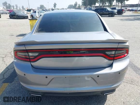 2015 Dodge Charger SE with VIN 2C3CDXBG8FH837060, listed as a IAAI auction lot 43397005 with 102,616 mi miles and . Bid and sale history available at DreamBid. Image 16.