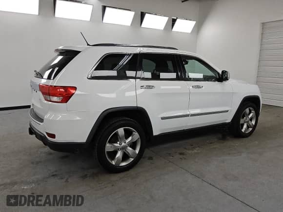 2013 Jeep Grand Cherokee Limited z VIN 1C4RJFBG3DC520134, wystawiony jako Copart lot #84387515 z przebiegiem 153 138 mil mil oraz Czysty tytuł • Clean title. Historia ofert i sprzedaży dostępna na DreamBid. Obrazek 3.