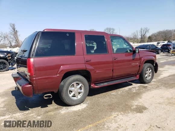 2000 Cadillac Escalade z VIN 1GYEK13R1YR123601, wystawiony jako Copart lot #48589225 z przebiegiem 258 998 mil mil oraz Szkoda całkowita • Salvage title. Historia ofert i sprzedaży dostępna na DreamBid. Obrazek 3.