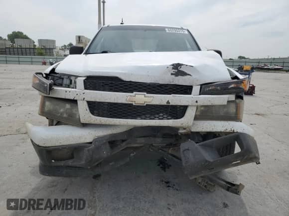 2009 Chevrolet Colorado Work Truck with VIN 1GCCS199698107938, listed as a Copart auction lot 60295315 with 132,264 mi miles and Salvage title. Bid and sale history available at DreamBid. Image 5.
