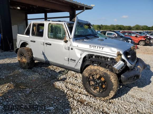 2024 Jeep Wrangler Willys with VIN 1C4PJXDG8RW250382, listed as a Copart auction lot 52066885 with 5,315 mi miles and Salvage title. Bid and sale history available at DreamBid. Image 4.