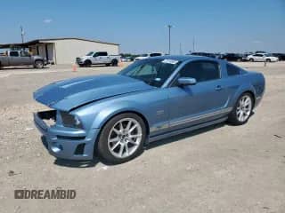 2006 Ford Mustang GT Deluxe с VIN 1ZVHT82H965245593, выставлен на аукционе Copart как лот 70193985 с пробегом Не указан миль и Списание • Salvage title. История ставок и продаж доступна на DreamBid. Изображение 1.