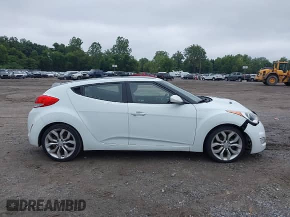 2013 Hyundai Veloster w/Gray Int z VIN KMHTC6AD0DU151892, wystawiony jako IAAI lot #43034606 z przebiegiem 138 148 mil mil oraz . Historia ofert i sprzedaży dostępna na DreamBid. Obrazek 12.