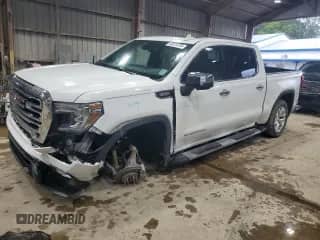 2020 GMC Sierra 1500 SLT with VIN 3GTU9DET9LG413245, listed as a Copart auction lot 82076705 with 100,464 mi miles and Salvage title. Bid and sale history available at DreamBid. Image 1.