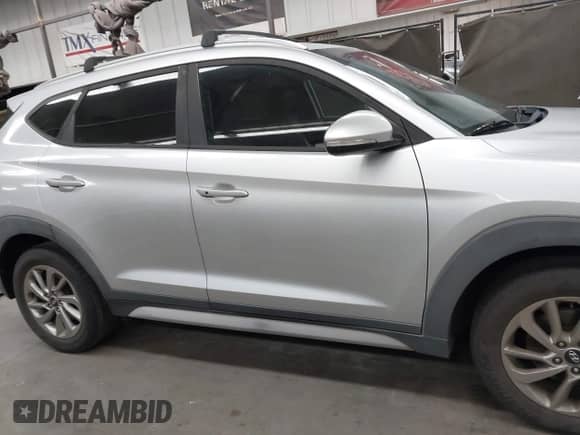2017 Hyundai Tucson SE with VIN KM8J33A4XHU418628, listed as a IAAI auction lot 42991252 with 96,322 mi miles and . Bid and sale history available at DreamBid. Image 13.