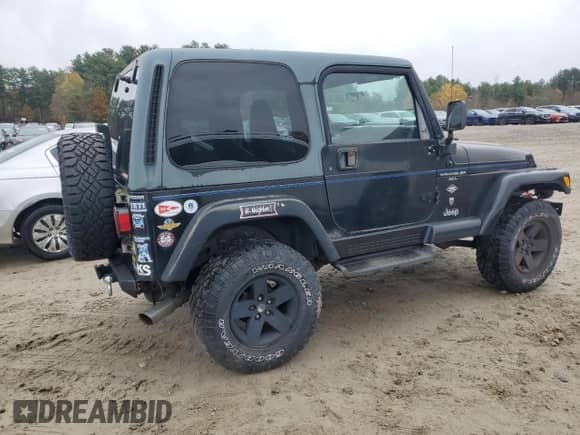 2001 Jeep Wrangler Sport z VIN 1J4FA49SX1P347129, wystawiony jako Copart lot #90684705 z przebiegiem 139 975 mil mil oraz Czysty tytuł • Clean title. Historia ofert i sprzedaży dostępna na DreamBid. Obrazek 3.