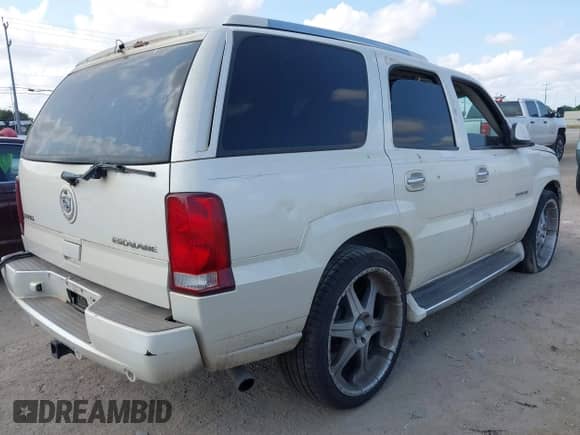 2003 Cadillac Escalade with VIN 1GYEK63N63R165281, listed as a IAAI auction lot 42884054 with Not provided miles and . Bid and sale history available at DreamBid. Image 4.