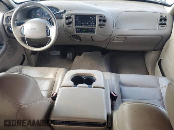 2002 Ford F-150 XLT с VIN 1FTRW07652KA97106, выставлен на аукционе Copart как лот 64258685 с пробегом 117 973 миль миль и Списание • Salvage title. История ставок и продаж доступна на DreamBid. Изображение 8.