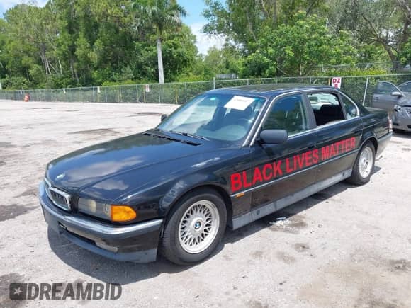 1997 BMW 7 Series 740iL with VIN WBAGJ8327VDM01744, listed as a IAAI auction lot 42880247 with 170,109 mi miles and . Bid and sale history available at DreamBid. Image 2.