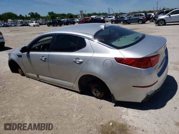 2014 Kia Optima LX с VIN 5XXGM4A71EG286307, выставлен на аукционе Copart как лот 58336974 с пробегом Не указан миль и Списание • Salvage title. История ставок и продаж доступна на DreamBid. Изображение 2.