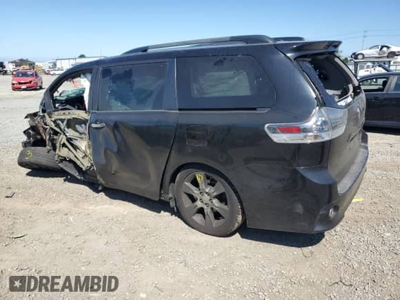 2015 Toyota Sienna SE with VIN 5TDXK3DC0FS582752, listed as a Copart auction lot 71443495 with Not provided miles and Salvage title. Bid and sale history available at DreamBid. Image 2.