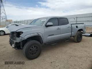 2019 Toyota Tacoma SR5 with VIN 3TMBZ5DN1KM018623, listed as a Copart auction lot 52573395 with 59,848 mi miles and Salvage title. Bid and sale history available at DreamBid. Image 1.