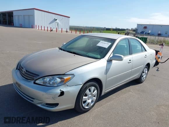 2004 Toyota Camry LE with VIN 4T1BE32K74U331873, listed as a IAAI auction lot 43420751 with 176,599 mi miles and . Bid and sale history available at DreamBid. Image 2.