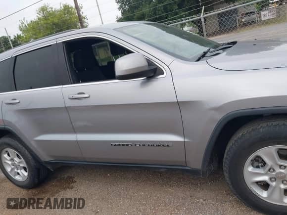2017 Jeep Grand Cherokee Laredo with VIN 1C4RJEAG6HC757086, listed as a IAAI auction lot 42114231 with 148,790 mi miles and . Bid and sale history available at DreamBid. Image 13.