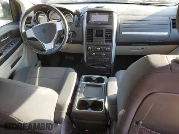2009 Dodge Caravan with VIN 2D8HN44X39R672674, listed as a Copart auction lot 73094654 with 205,972 mi miles and Salvage title. Bid and sale history available at DreamBid. Image 8.