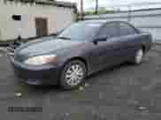 2002 Toyota Camry LE with VIN 4T1BE32K72U508340, listed as a Copart auction lot 86317005 with 216,628 mi miles and Salvage title. Bid and sale history available at DreamBid. Image 1.