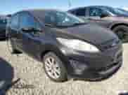 2011 Ford Fiesta SE with VIN 3FADP4EJ6BM181035, listed as a Copart auction lot 85318875 with 112,186 mi miles and Clean title. Bid and sale history available at DreamBid. Image 4.