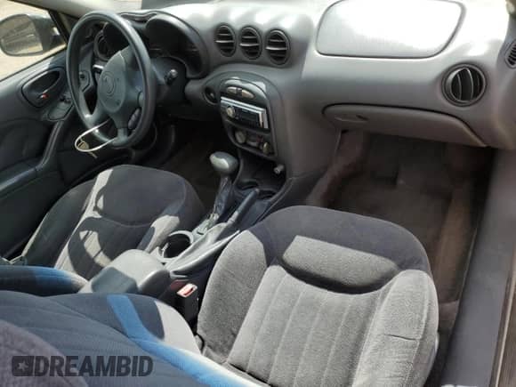 2000 Pontiac Grand Am with VIN 1G2NF12T1YM775871, listed as a Copart auction lot 70202755 with 131,564 mi miles and Clean title. Bid and sale history available at DreamBid. Image 8.