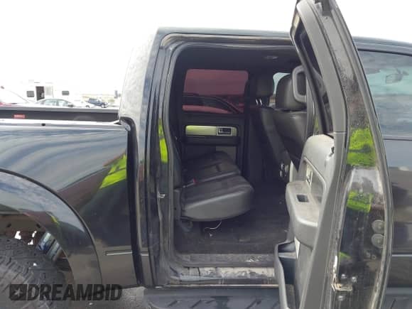 2013 Ford F-150 SVT Raptor z VIN 1FTFW1R68DFC03131, wystawiony jako IAAI lot #43321375 z przebiegiem 162 975 mil mil oraz . Historia ofert i sprzedaży dostępna na DreamBid. Obrazek 8.