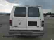 1999 Ford Econoline Cargo z VIN 1FTRE1427XHA24379, wystawiony jako Copart lot #63539135 z przebiegiem 91 158 mil mil oraz Czysty tytuł • Clean title. Historia ofert i sprzedaży dostępna na DreamBid. Obrazek 6.