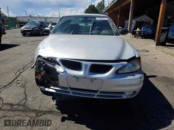 2003 Pontiac Grand Am SE с VIN 1G2NE52F93C259261, выставлен на аукционе Copart как лот 72060675 с пробегом 133 130 миль миль и Списание • Salvage title. История ставок и продаж доступна на DreamBid. Изображение 5.
