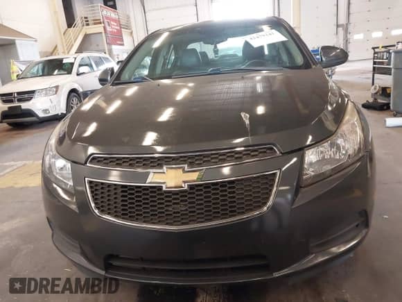 2013 Chevrolet Cruze 2LT z VIN 1G1PE5SB1D7109990, wystawiony jako IAAI lot #42479341 z przebiegiem 109 765 mil mil oraz . Historia ofert i sprzedaży dostępna na DreamBid. Obrazek 12.