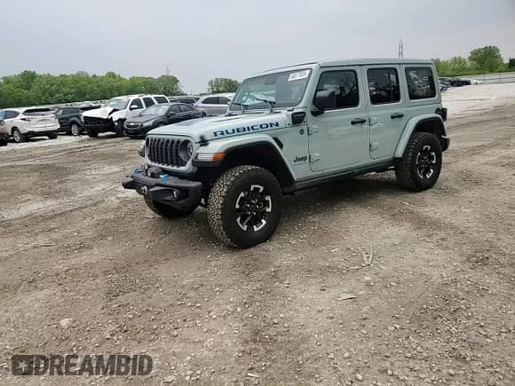 2024 Jeep Wrangler Rubicon with VIN 1C4RJXR66RW100859, listed as a Copart auction lot 58377805 with 9,426 mi miles and Salvage title. Bid and sale history available at DreamBid. Image 14.