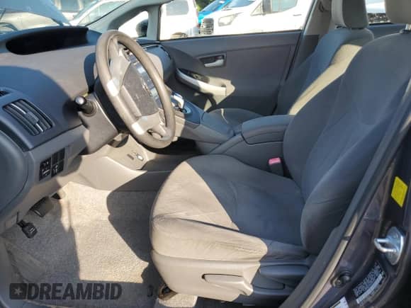 2011 Toyota Prius I with VIN JTDKN3DU3B0259593, listed as a Copart auction lot 64950605 with 180,210 mi miles and Salvage title. Bid and sale history available at DreamBid. Image 7.