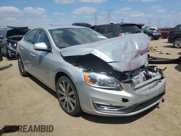2014 Volvo S60 T5 z VIN YV1612FH9E2293161, wystawiony jako Copart lot #68771915 z przebiegiem 52 472 mil mil oraz Szkoda całkowita • Salvage title. Historia ofert i sprzedaży dostępna na DreamBid. Obrazek 4.