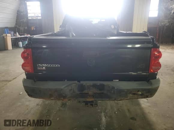 2007 Dodge Dakota SLT z VIN 1D7HW42N97S137556, wystawiony jako Copart lot #57611815 z przebiegiem 88 568 mil mil oraz Szkoda całkowita • Salvage title. Historia ofert i sprzedaży dostępna na DreamBid. Obrazek 6.