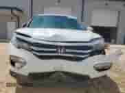 2017 Honda Pilot EX-L z VIN 5FNYF5H75HB005918, wystawiony jako Copart lot #60033435 z przebiegiem 99 999 mil mil oraz Czysty tytuł • Clean title. Historia ofert i sprzedaży dostępna na DreamBid. Obrazek 5.