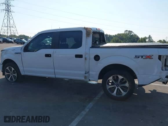 2020 Ford F-150 XL with VIN 1FTEW1C43LKD59554, listed as a IAAI auction lot 43181361 with 151,149 mi miles and . Bid and sale history available at DreamBid. Image 6.