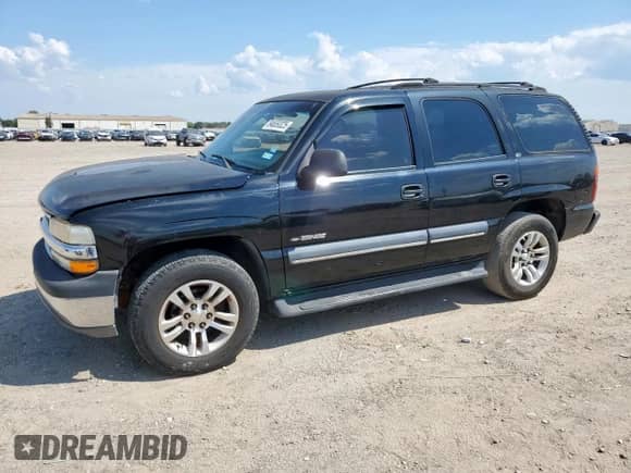 2002 Chevrolet Tahoe LS with VIN 1GNEC13Z92R219137, listed as a Copart auction lot 84659325 with 250,860 mi miles and Salvage title. Bid and sale history available at DreamBid. Image 1.