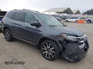 2021 Honda Pilot Touring 7-Passenger z VIN 5FNYF6H66MB045819, wystawiony jako IAAI lot #42095117 z przebiegiem 36 506 mil mil oraz . Historia ofert i sprzedaży dostępna na DreamBid. Obrazek 1.